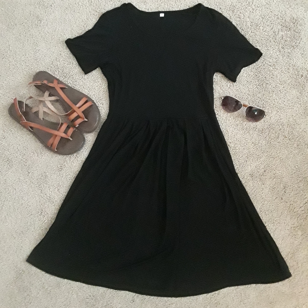 Black dress with pockets, round neck, size S